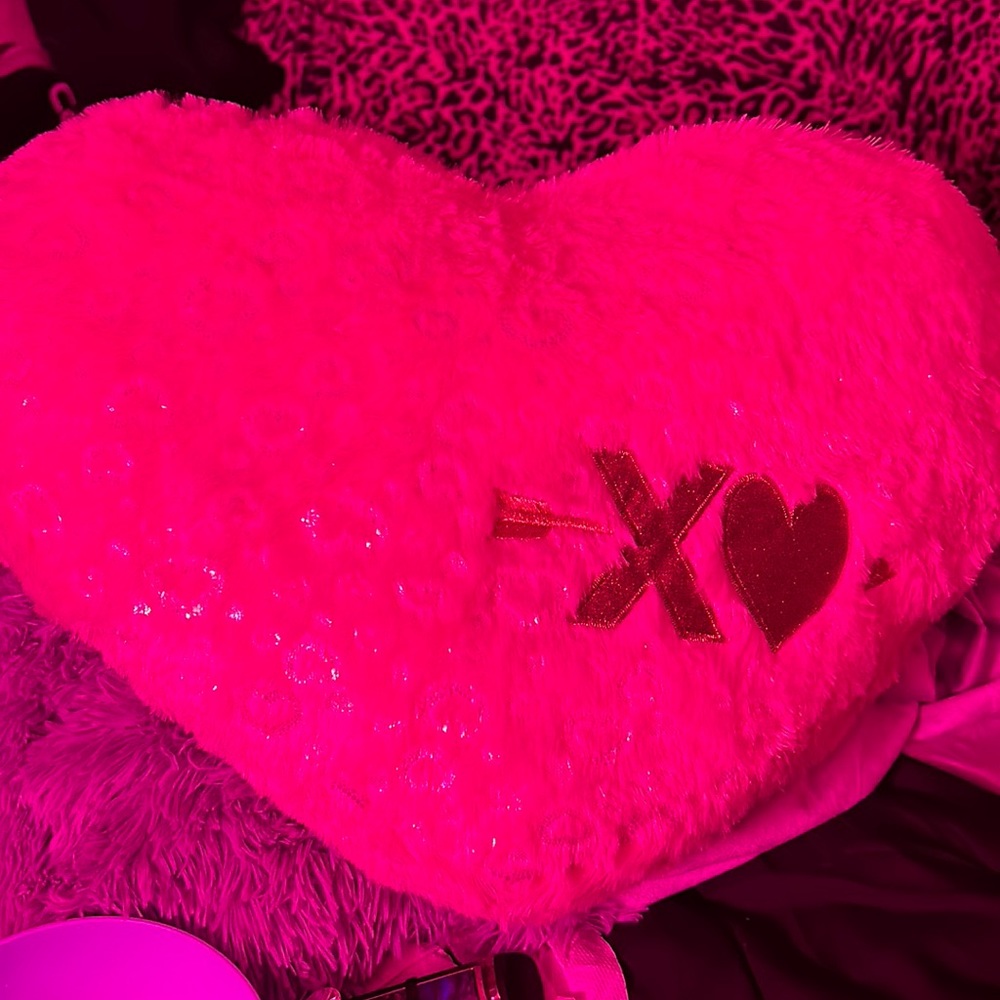 Pink heart shape throw pillow